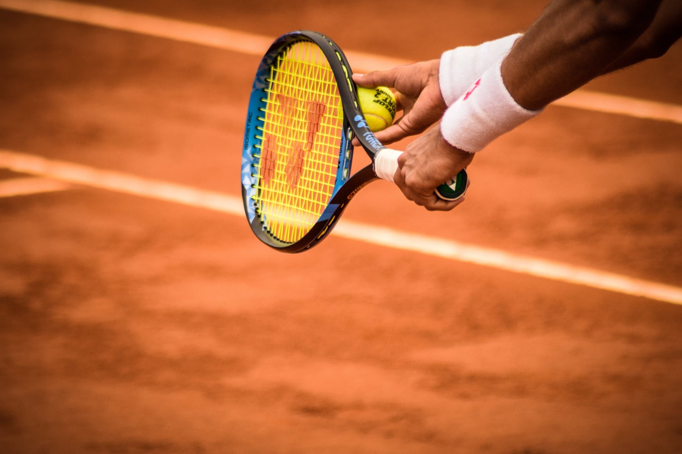 tennis ball spinning in the air